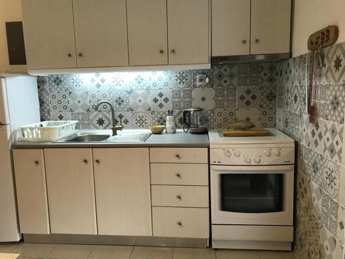 Grey Theros Apartments Paralia Dionysiou Ngoại thất bức ảnh