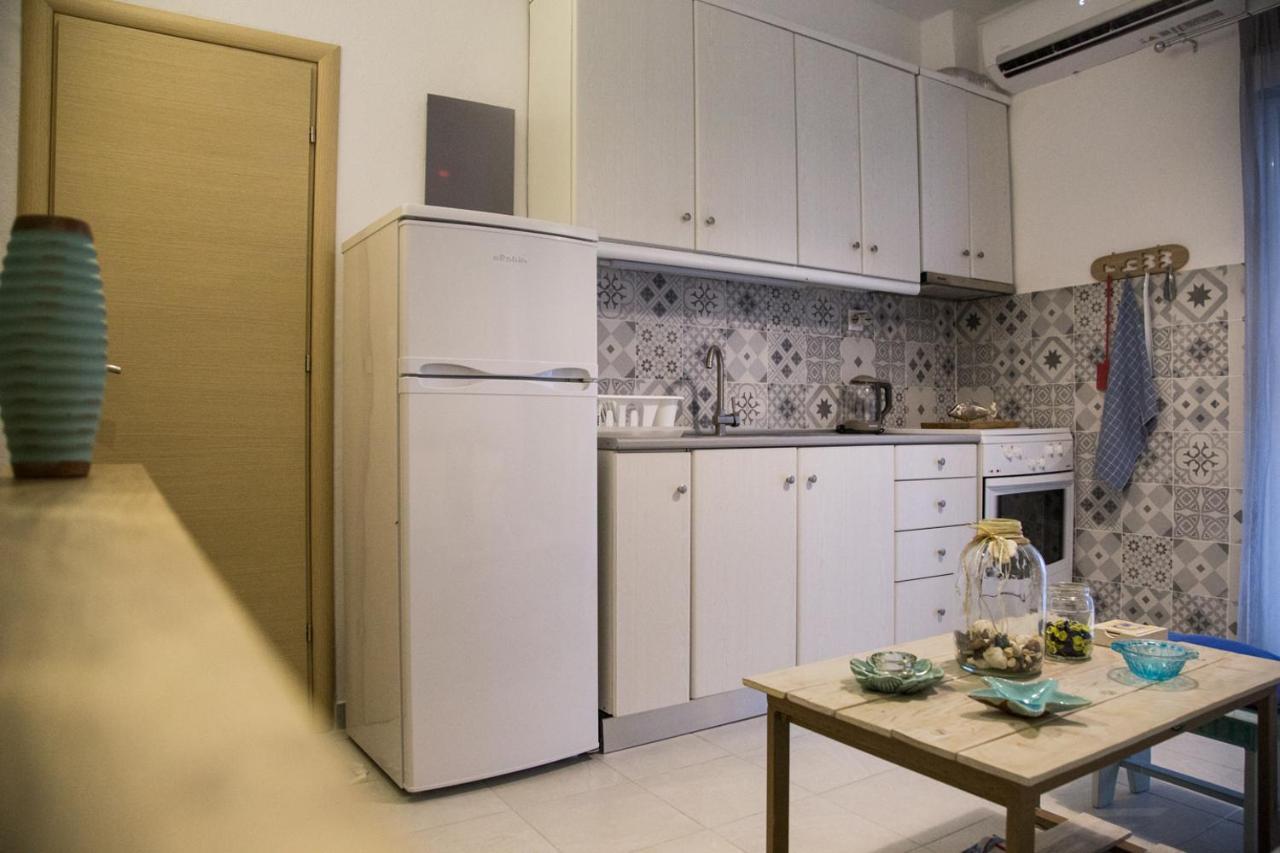 Grey Theros Apartments Paralia Dionysiou Ngoại thất bức ảnh